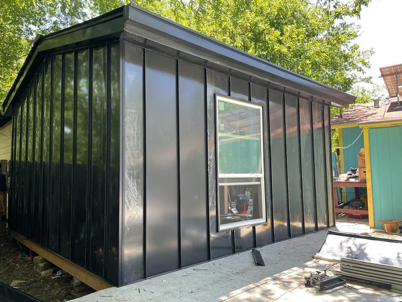 Black standing seam metal wall panels for Roof Inspection in Robeson